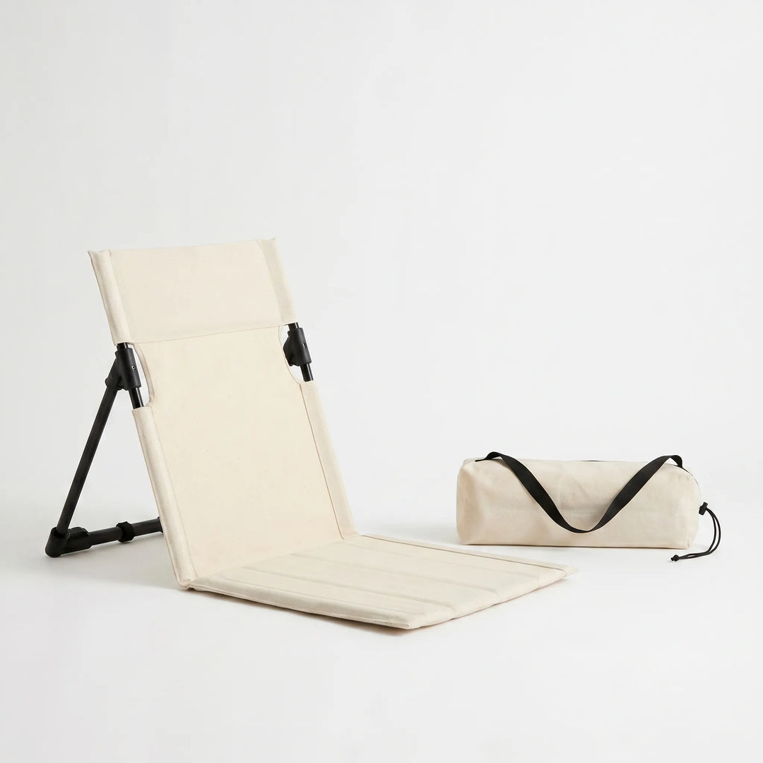 Comfortable picnic chair, a low-profile ground seat perfect for outdoor gatherings, parks & festivals. Easy setup.