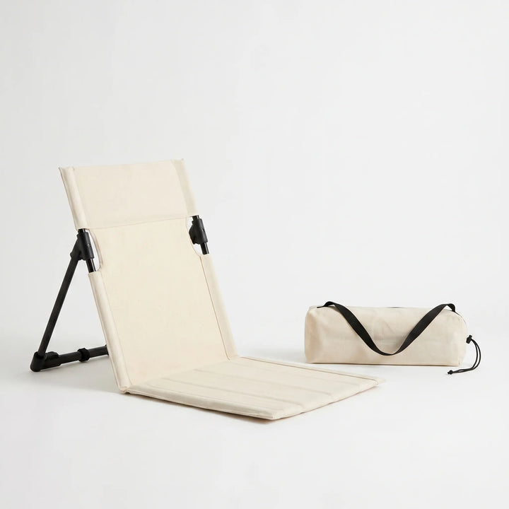 Comfortable picnic chair, a low-profile ground seat perfect for outdoor gatherings, parks & festivals. Easy setup.