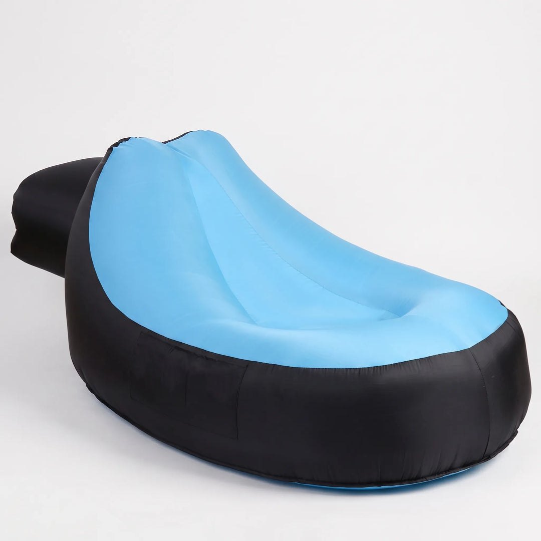 Comfortable inflatable sunlounger for outdoor relaxation. Portable air chair, ideal for garden, beach, camping.