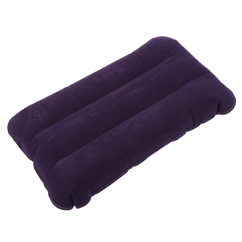 Inflated unisex travel dog pillow with a small dog sleeping comfortably on it, camping gear