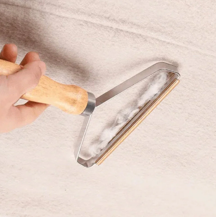 Eco-friendly fabric shaver and lint remover for clothing, upholstery. Two portable units for versatile use.