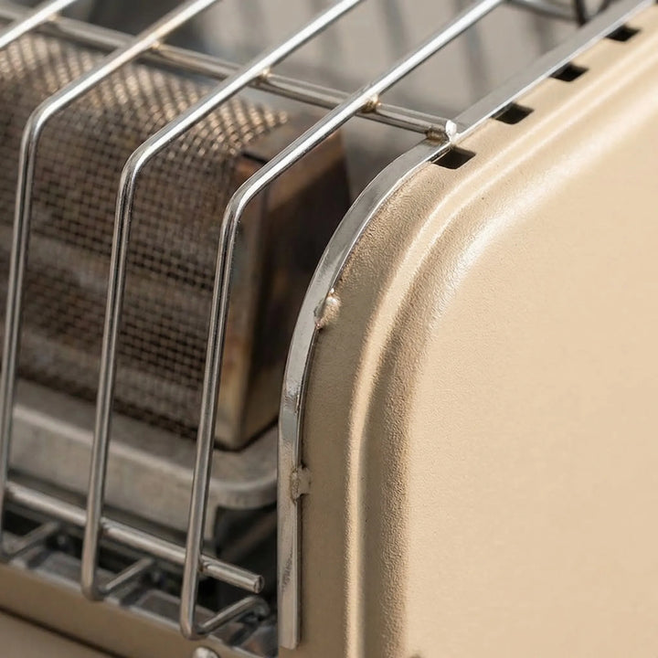 Compact tabletop portable gas heater, essential for outdoor camping trips & cold weather activities. Easy to use.