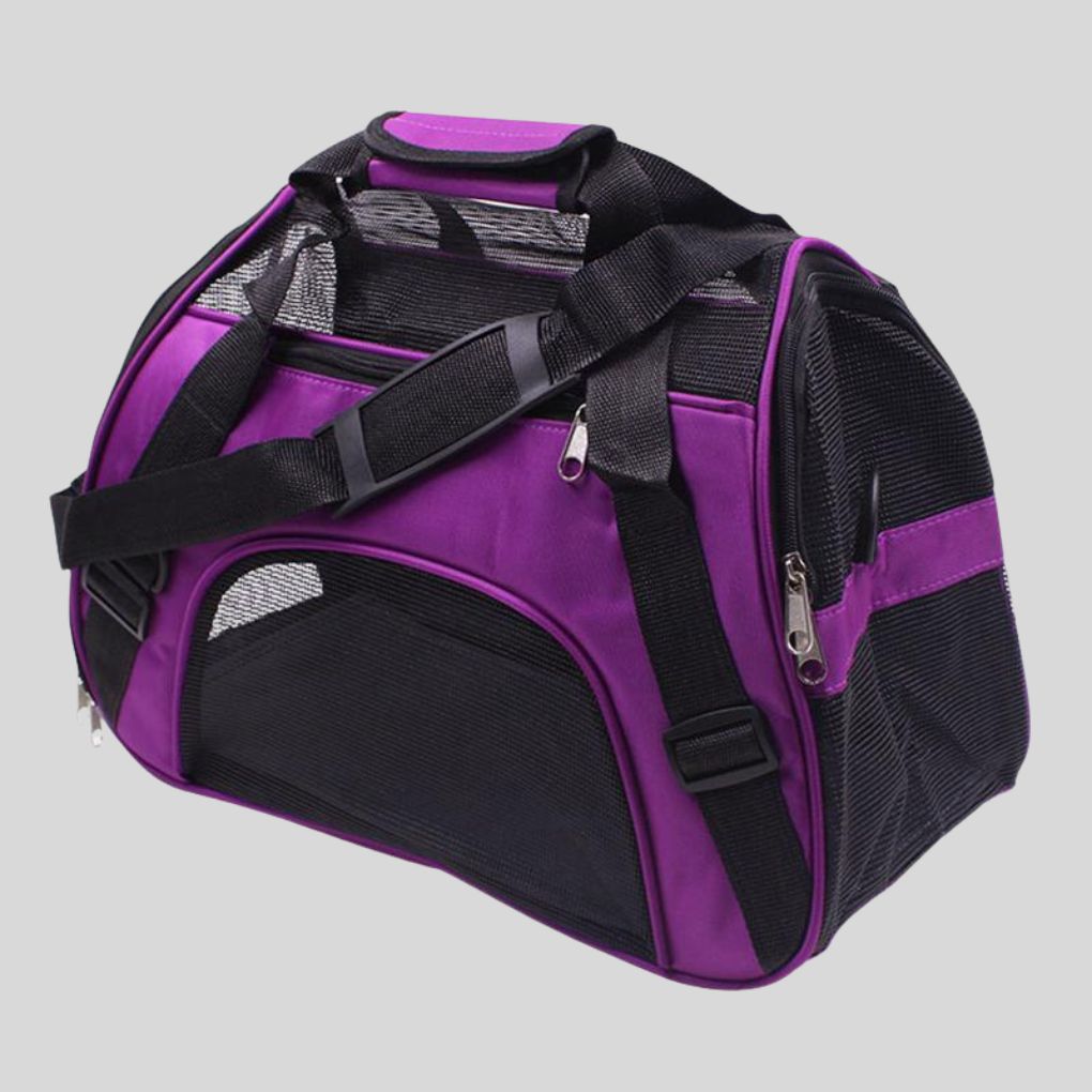 Portable pet carrier bag for small dogs and cats, soft-sided with mesh windows, black color.