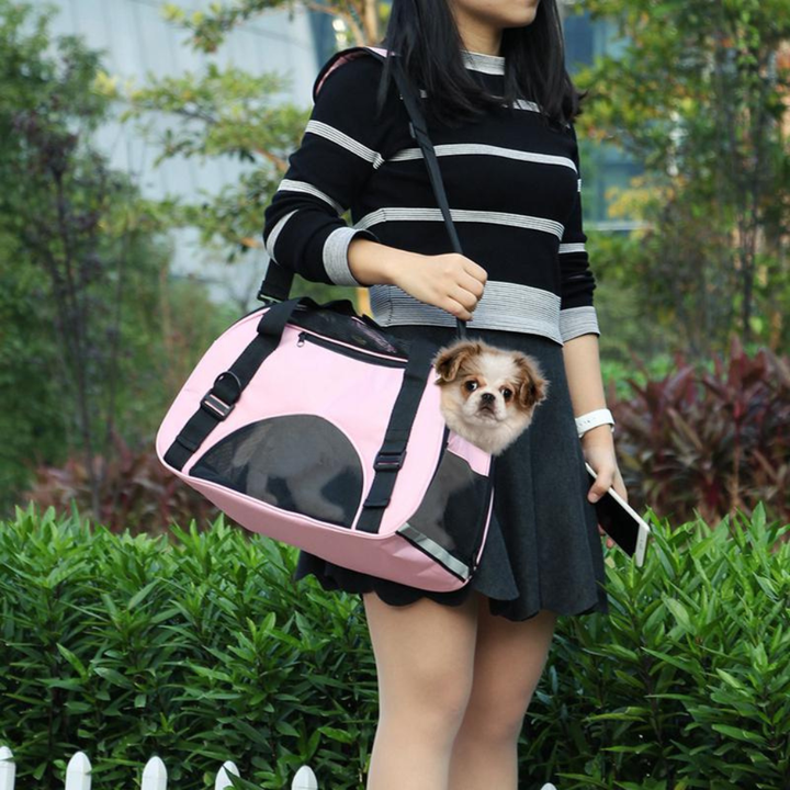 Travel pet carrier for small pets, featuring secure zippers and comfortable handles, gray/black.