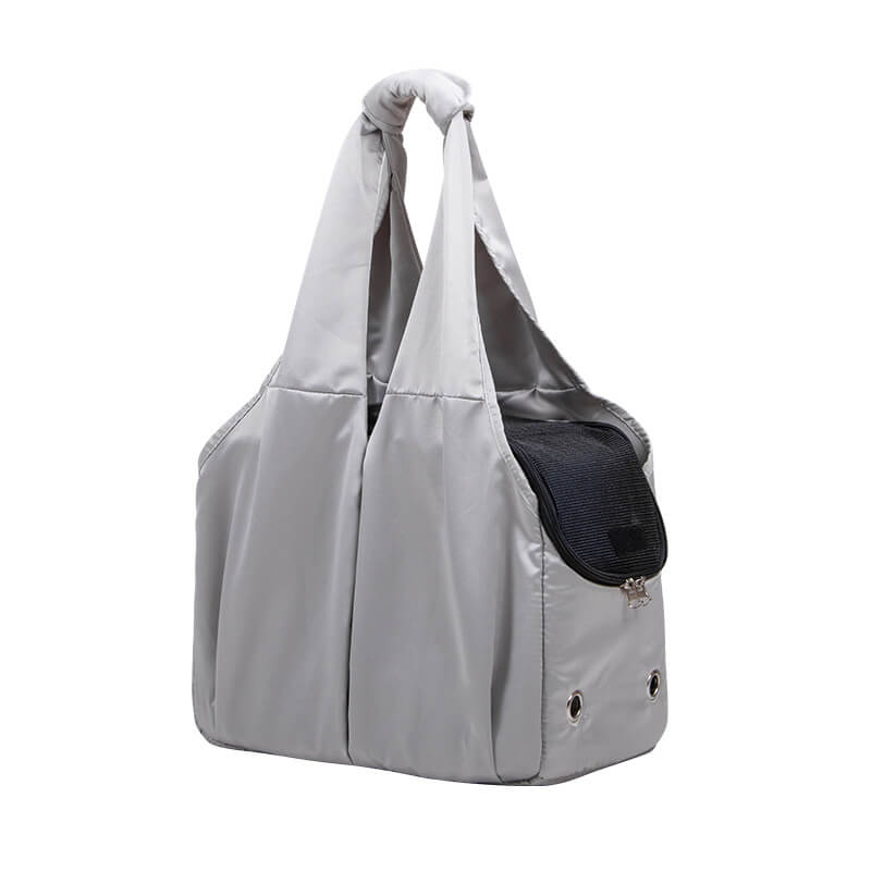 Black portable pet shoulder bag, a secure and convenient way to carry small pets.