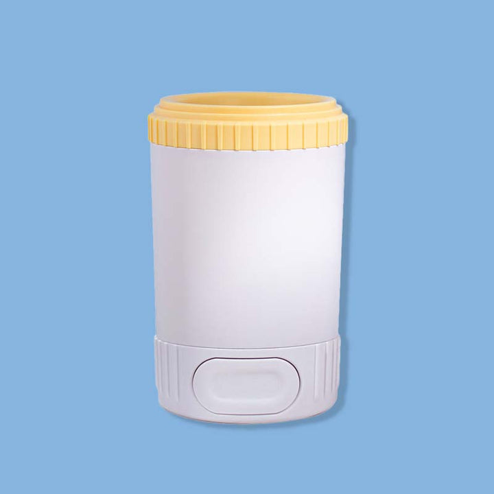 Portable pet paw cleaner with silicone bristles for dogs, removing mud & dirt, convenient pet hygiene.