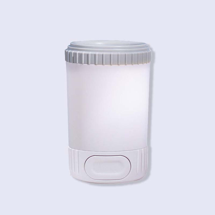 Portable pet paw cleaner alongside a happy dog, emphasizing pet hygiene and clean home, essential dog supplies.