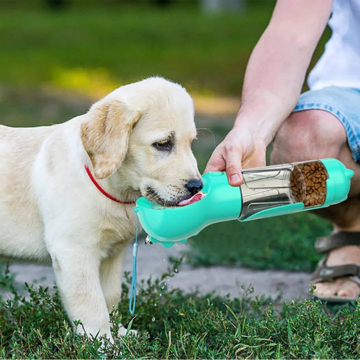 Unisex pet travel drink bottle & food container with integrated waste bag dispenser for outdoor dog adventures