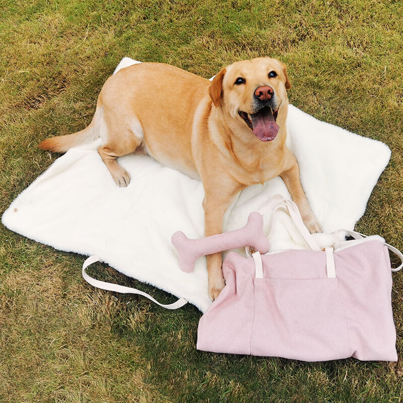 Portable pet travel mat for dogs and cats, soft and comfortable for car or camping adventures.
