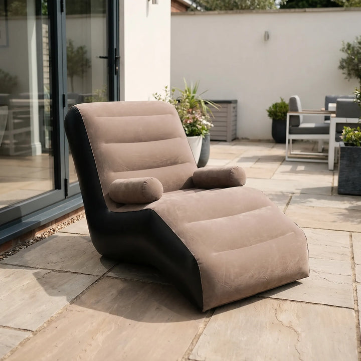 Portable S-shaped inflatable lounger for ultimate indoor & outdoor comfort. Ergonomic design perfect for relaxing.