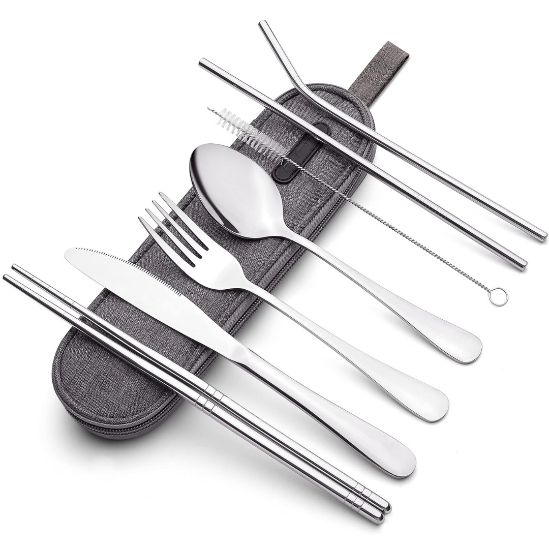 Stainless steel travel utensil set with fork, spoon, knife, and chopsticks in a compact case.