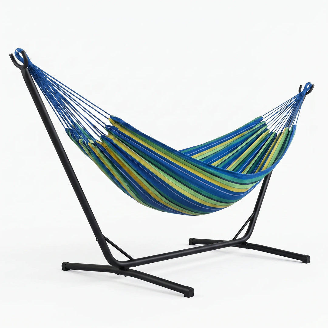 Comfortable canvas striped hammock, ideal for outdoor relaxation, camping, and garden leisure. Portable design.