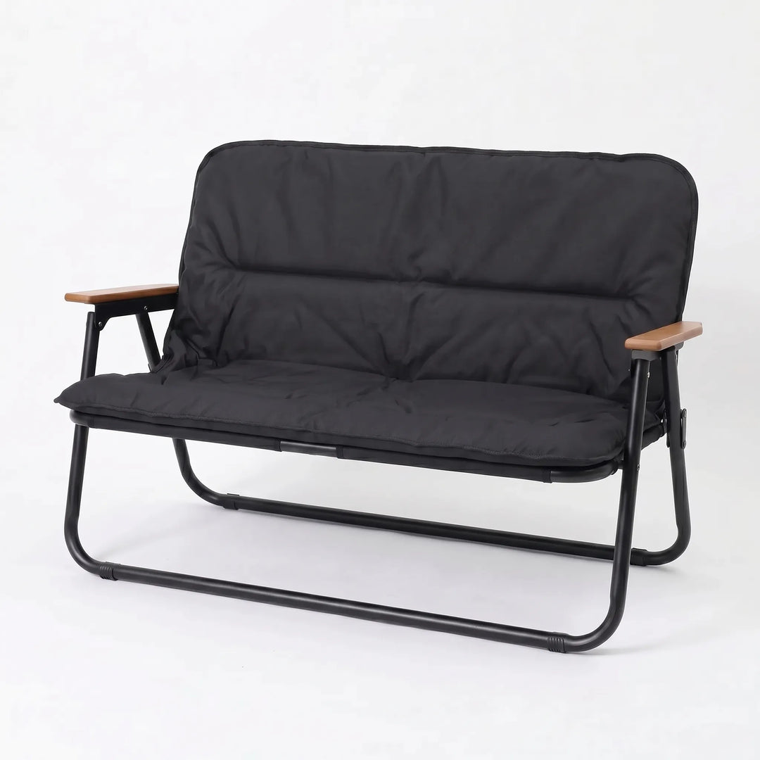 Stylish two-person camp sofa, a durable and portable outdoor seating solution for any adventure.