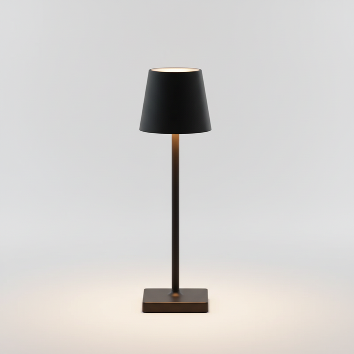 Versatile portable LED table lamp for cordless indoor/outdoor lighting, enhancing modern home ambiance.