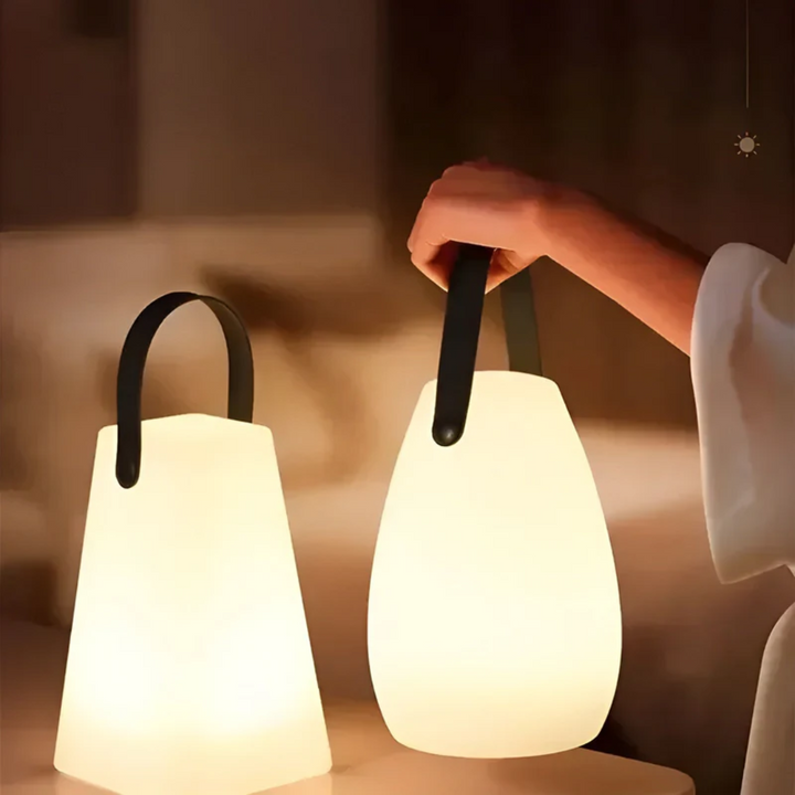 Rechargeable wireless LED table lamp, RadianceFlex, offers portable, cord-free illumination for any space.