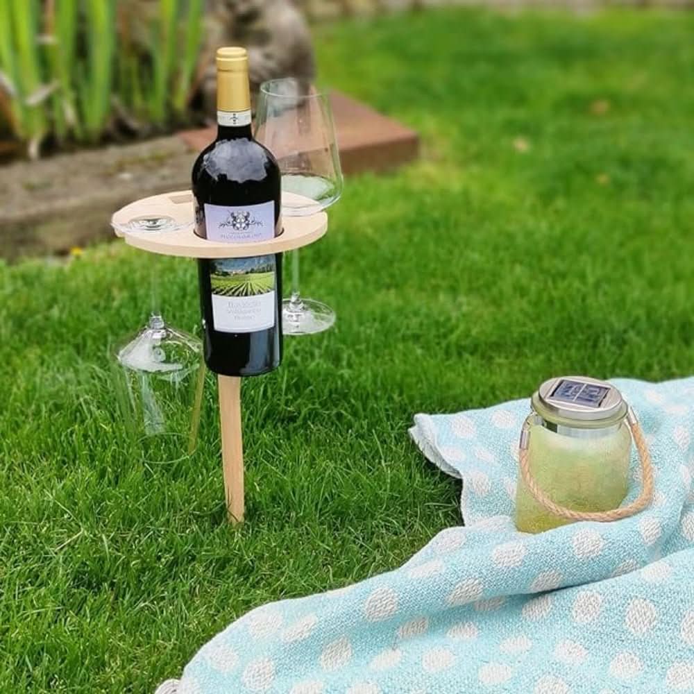 Stylish portable picnic table with wine slots & snack space, ideal for garden enjoyment, outdoor entertaining & gifts.