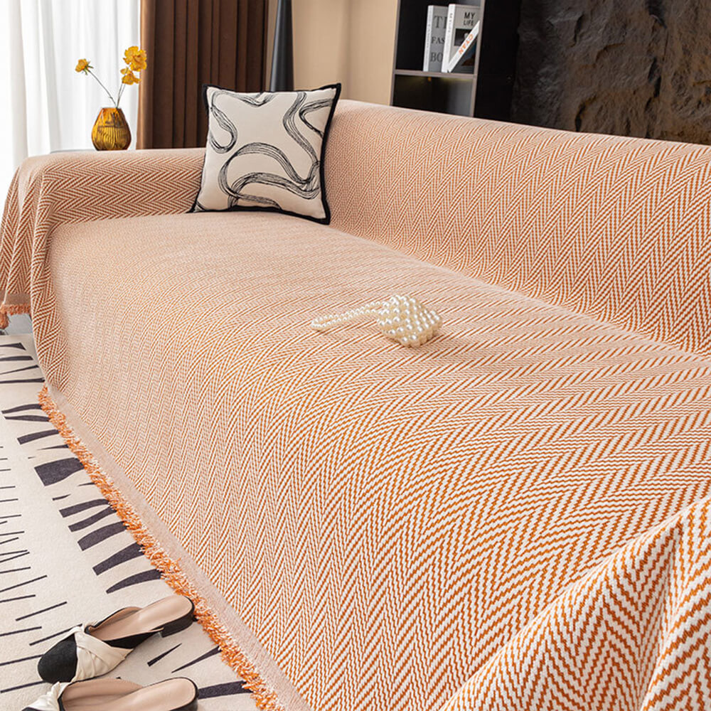 Premium chenille herringbone sofa throw cover with fringe, elegant living room decor.