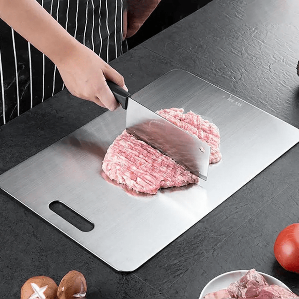 Durable, rust-proof stainless steel cutting board ensuring hygienic food prep. Easy to clean & dishwasher safe for kitchens.