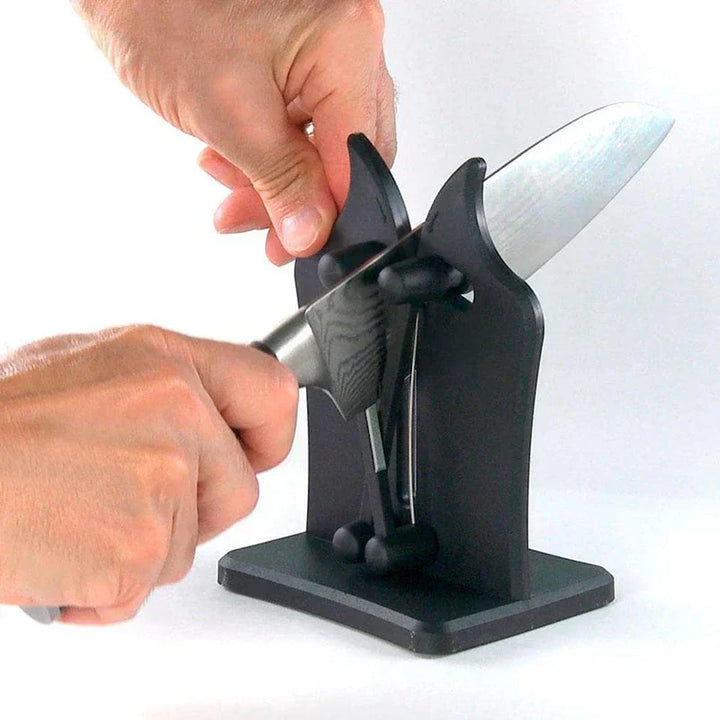 Compact triple-action knife sharpening tool, essential for keeping kitchen knives incredibly sharp.