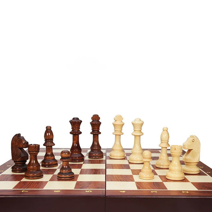 Solid wood chess pieces neatly stored inside the folding wooden board, ensuring safe keeping for this classic strategy game.