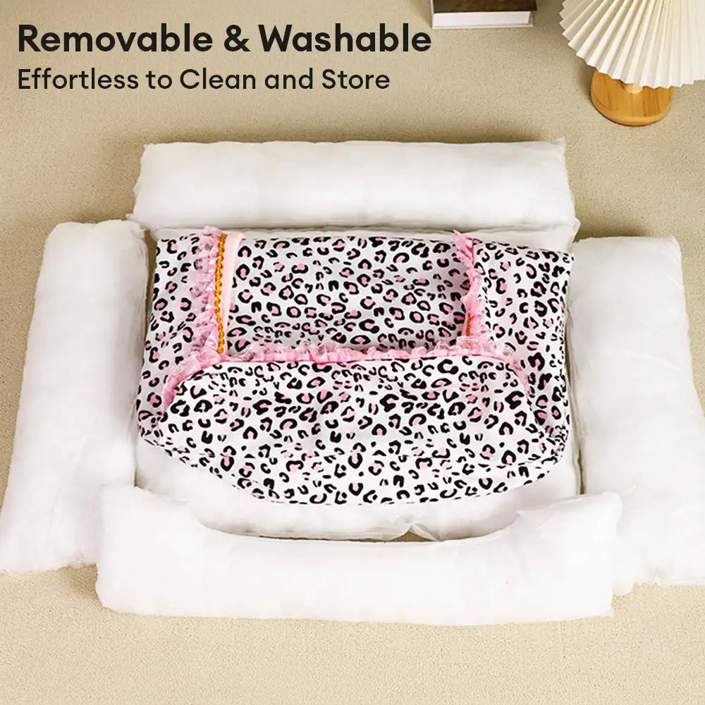 Leopard print princess pet bed offering luxurious comfort for small pets, durable fabric.