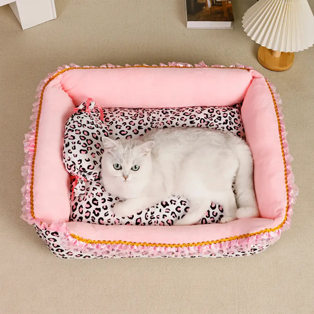 Washable leopard print princess pet bed, perfect for small dogs, adds charm to pet furniture.