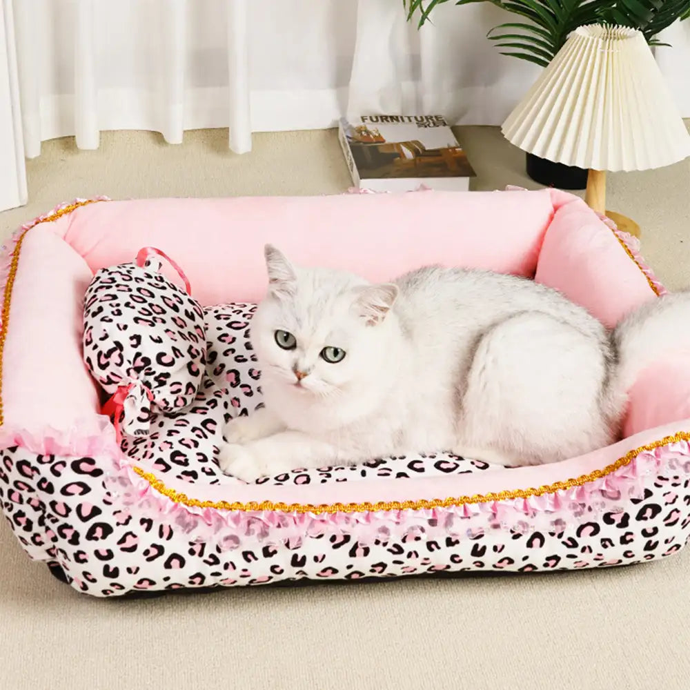 Chic princess pet bed, leopard print design and plush interior for ultimate pet comfort.