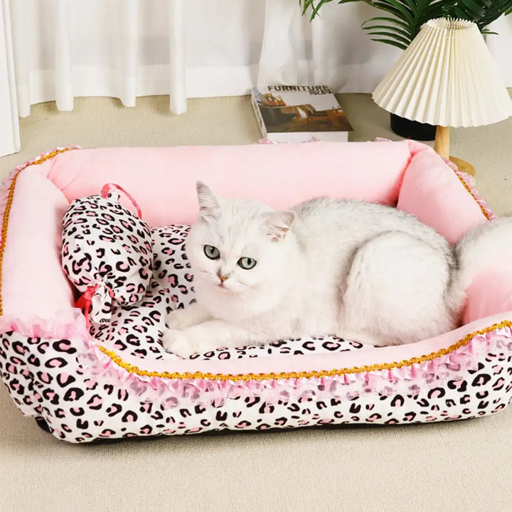 Chic princess pet bed, leopard print design and plush interior for ultimate pet comfort.