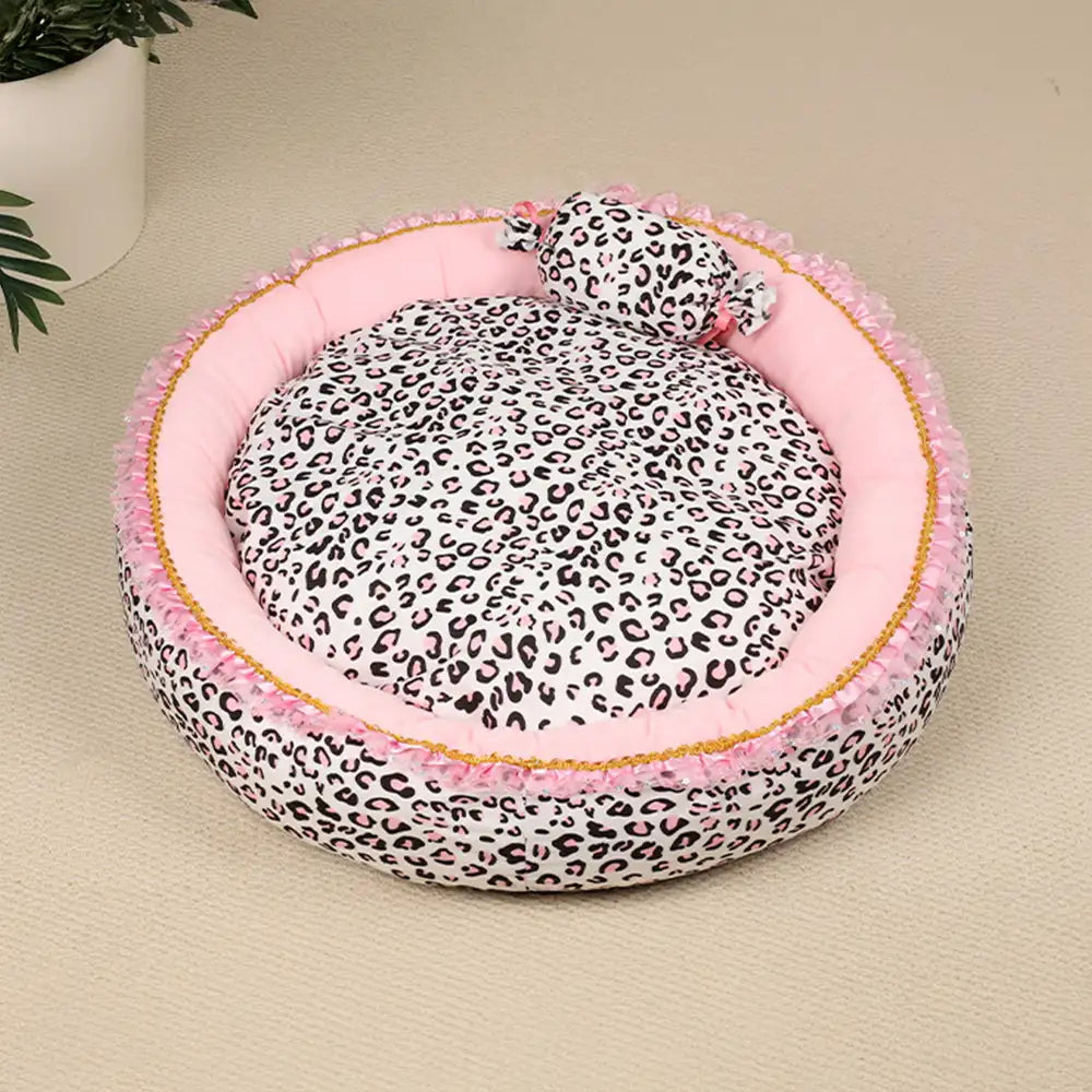 Cozy leopard print princess dog bed, designed for maximum comfort and easy machine washing.