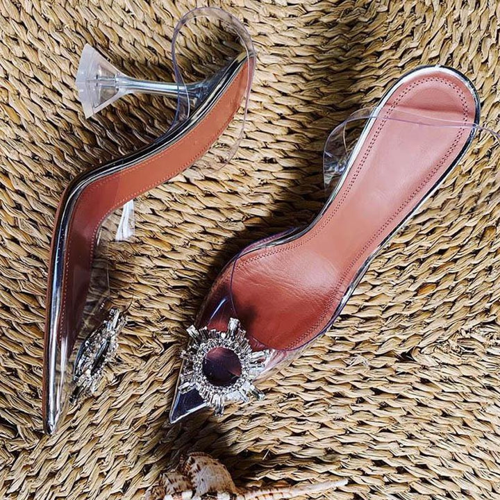Stunning clear perspex high heels for women, adorned with brilliant crystals & a chic pointed toe design.