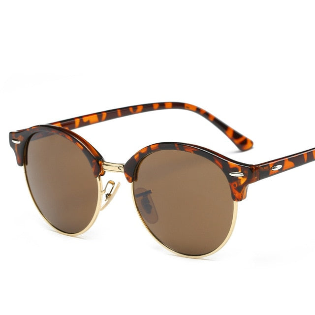 Trendy unisex alloy frame sunglasses. Offers UV400 eye protection & anti-reflective coating for clear vision.