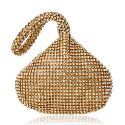Chic gold mini shoulder bag. This women's Chicago style purse offers an elegant accessory for versatile evening wear.