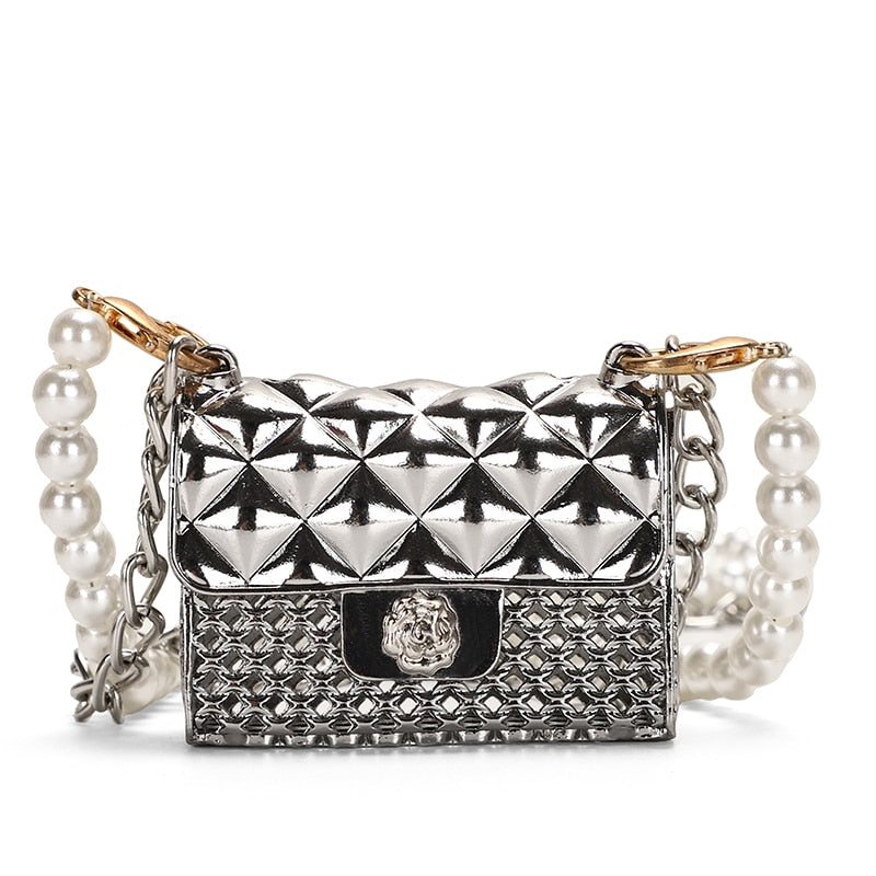 Fashionable mini rhinestone women's handbag, a shimmering clutch accessory for elegant evenings & events.