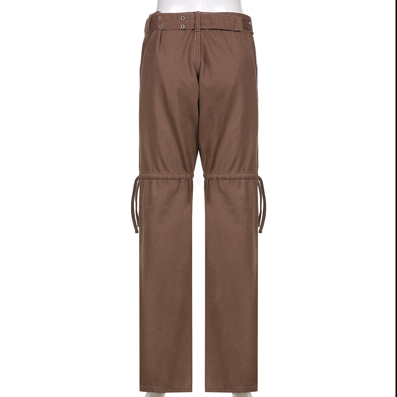 Fashionable women's bottoms: aesthetic jeans with statement sashes. Great for casual & grunge outfits.