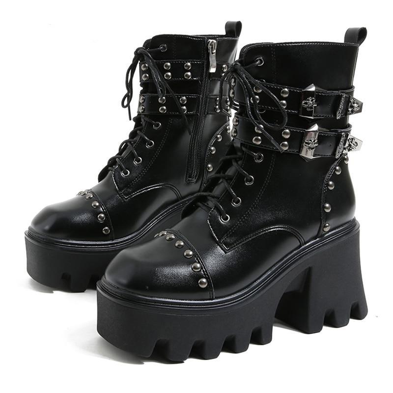 Stylish women's platform ankle boots. Waterproof gothic footwear with comfortable chunky heel for edgy looks.