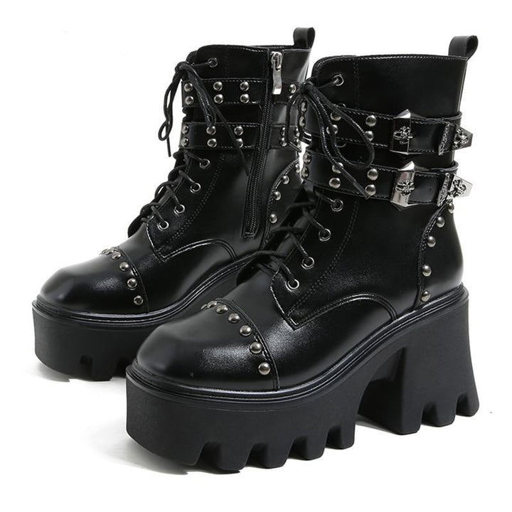 Stylish women's platform ankle boots. Waterproof gothic footwear with comfortable chunky heel for edgy looks.