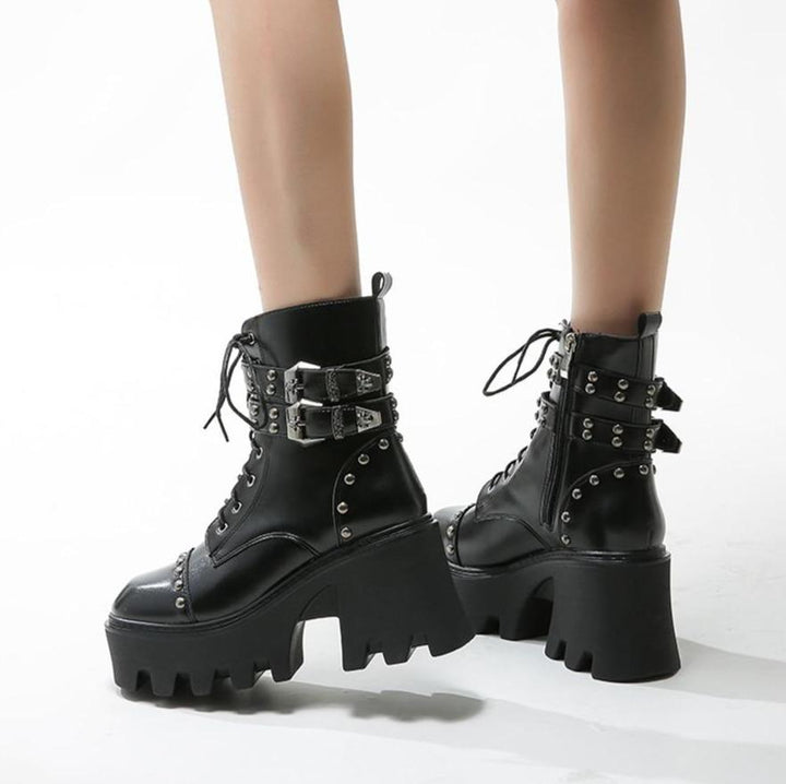 Pair of women's edgy gothic platform ankle boots, featuring sturdy chunky heels & a comfortable, fashionable design.