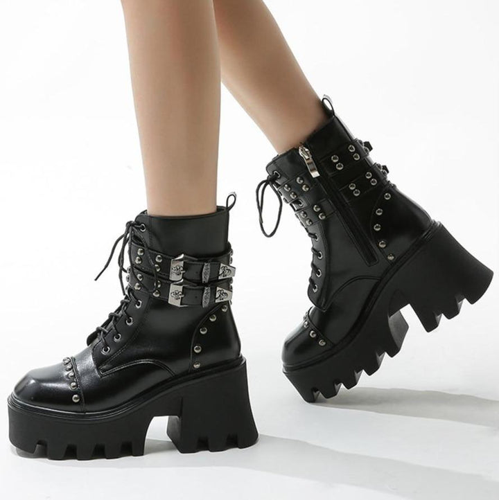 Full view of women's black gothic platform boots. Edgy design, chunky sole & comfortable fit for alternative style.