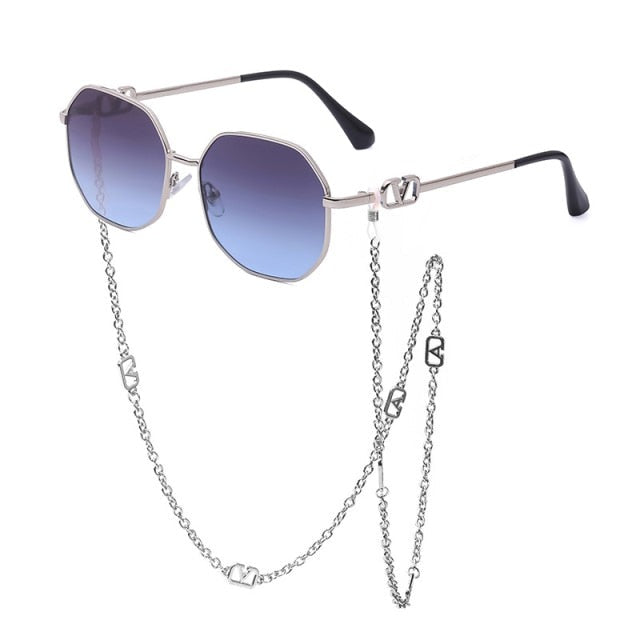 Lightweight alloy sunglasses with polycarbonate lenses, offering comfortable UV400 protection.
