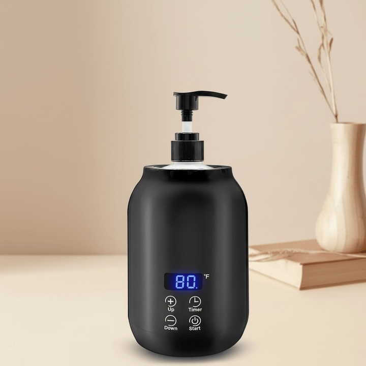 Compact electric massage oil warmer for relaxing warm oil therapy at home, enhances personal wellness.