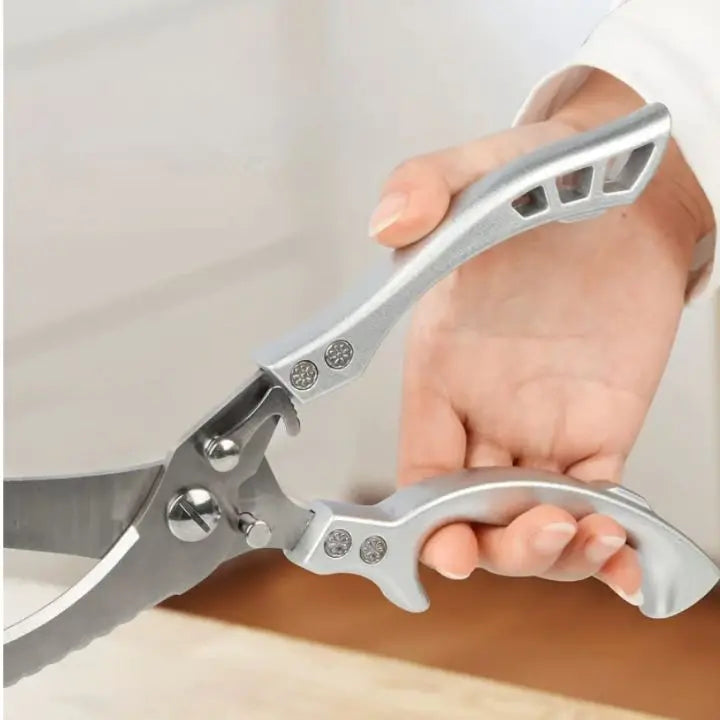 Professional grade kitchen tool: stainless steel meat scissors for quick and efficient food prep.