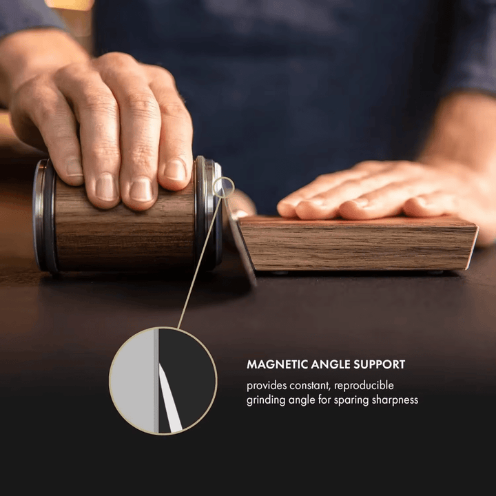 Ergonomic kitchen knife sharpener, a chef's tool with diamond and ceramic sharpening wheels.