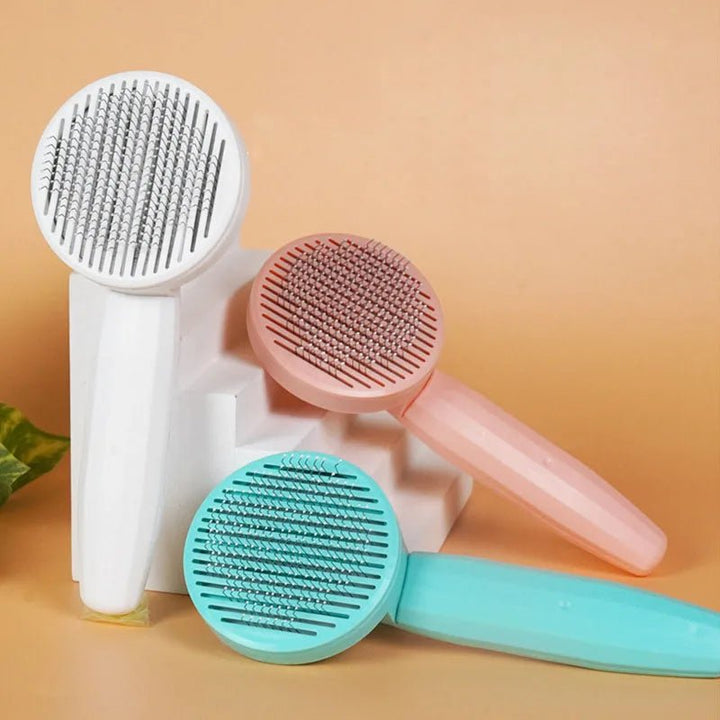 Self-cleaning pet dematting comb for cats and dogs, great for hair removal and promoting a healthy coat.