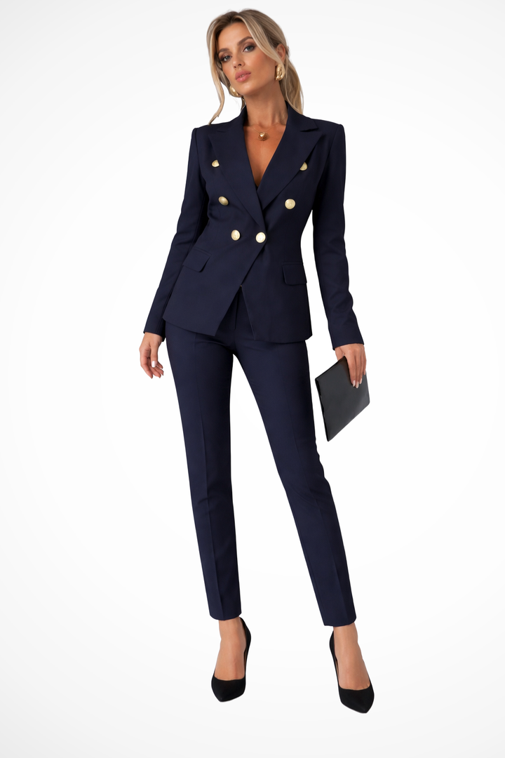 Women's elegant office outfit: a sharp double-breasted blazer & tailored pants for a polished professional look.