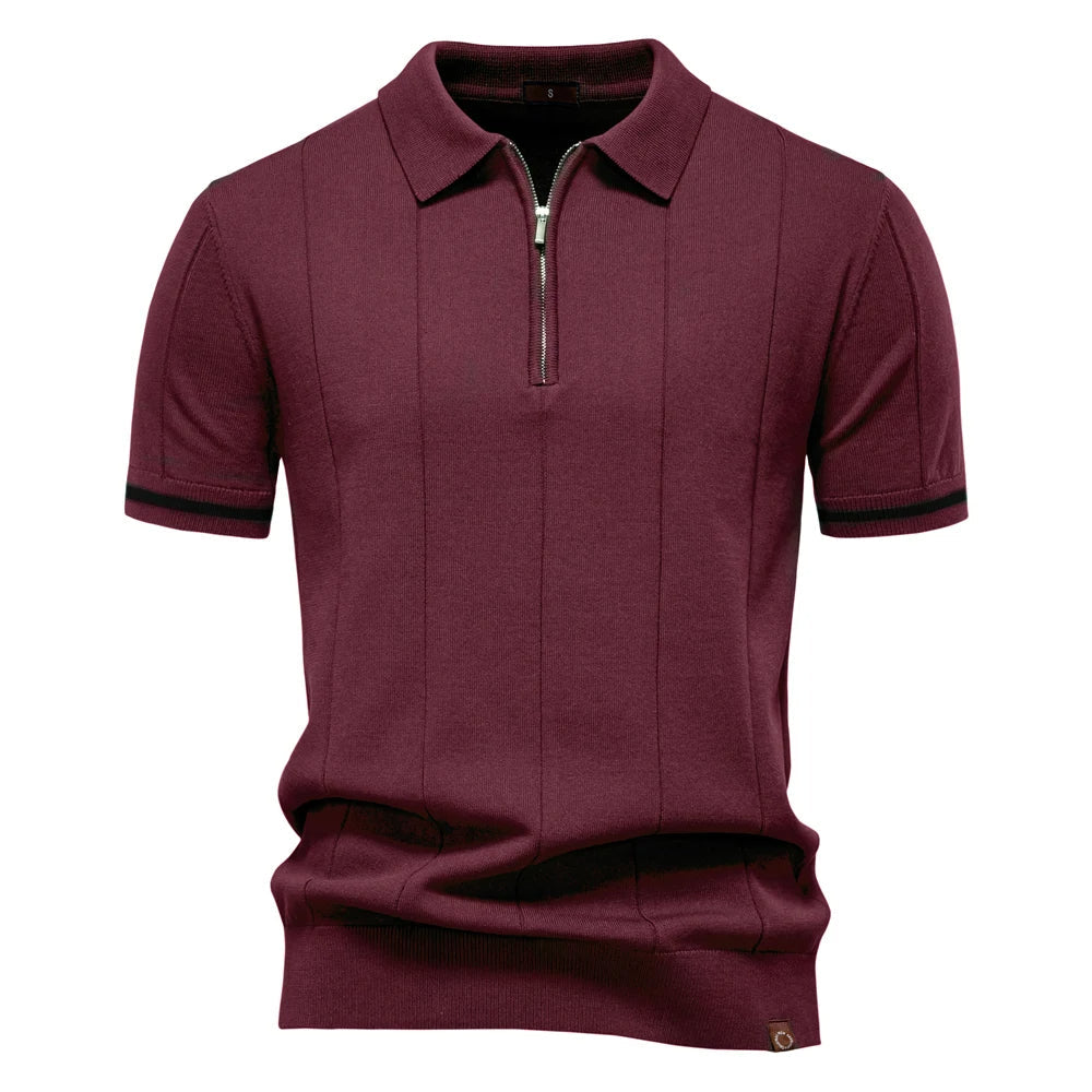 Modern men's quarter-zip polo top, knit material ensures comfort and a sophisticated casual look.