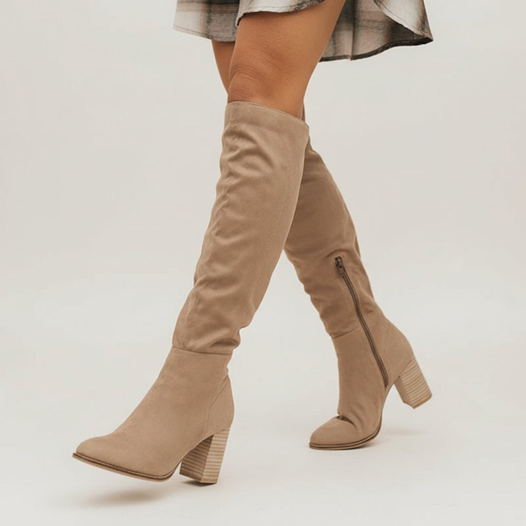 Stylish ladies' knee-high block heel boots, perfect for comfortable and elegant fall & winter outfits with side zip.