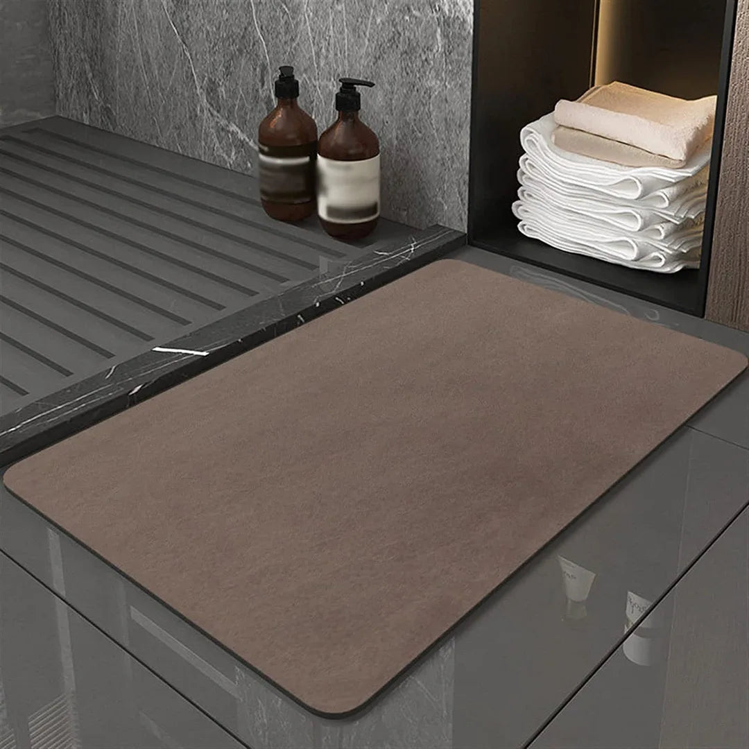 Anti-slip diatomite shower mat, quick-dry technology for a safe & clean modern bathroom.
