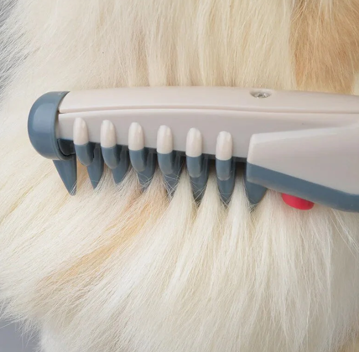 Hand holding a cordless quiet pet hair clipper, highlighting its portable design for easy and efficient pet grooming