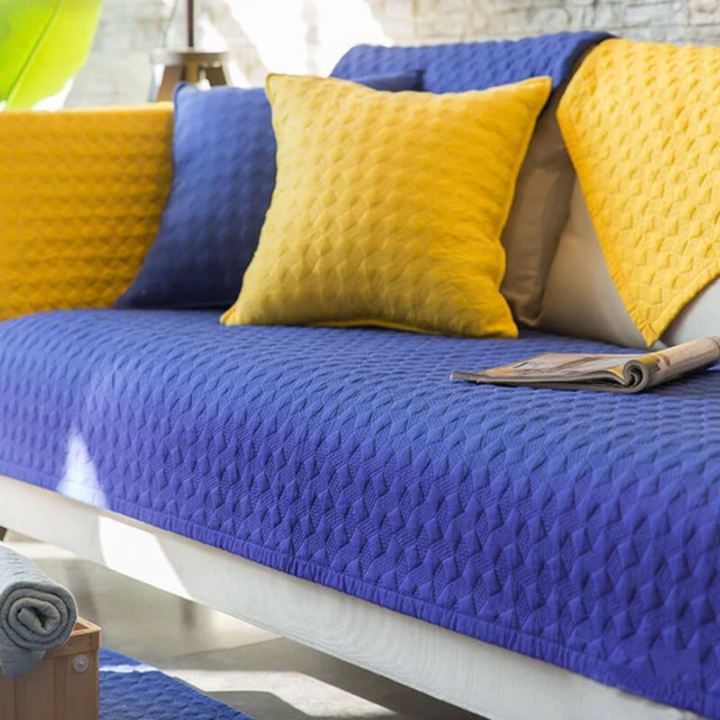 Dark grey quilted anti-slip sectional sofa slipcover, perfect for high-traffic living room areas