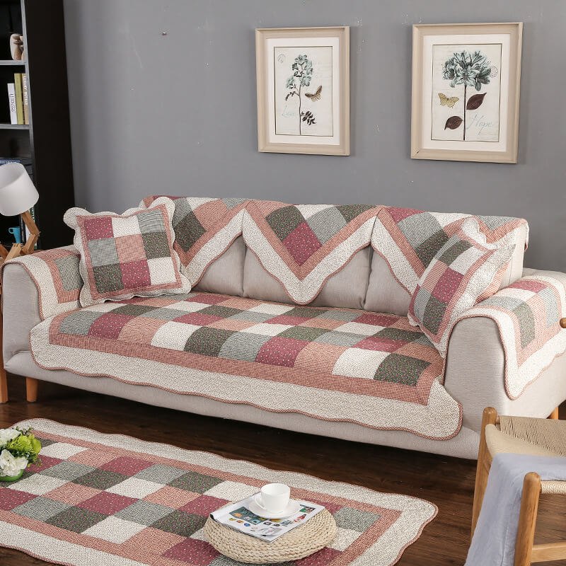 Quilted cotton blend sofa cover, non-slip, washable, breathable, light gray for furniture protection.
